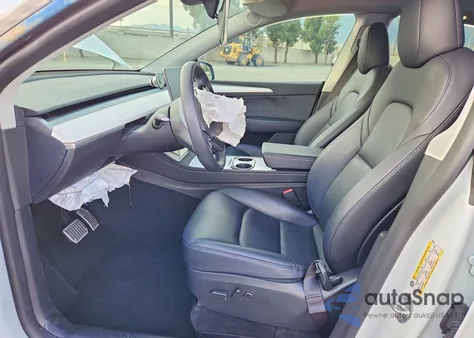 2023 Tesla Model Y z USA, uszkodzony, nr VIN 7SAYGDEDXPF962628